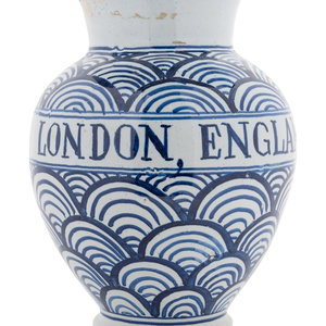 Appraisal: A Fa ence Jar marked LONDON ENGLAND to the body