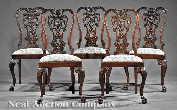 Appraisal: A Set of Twelve Georgian-Style Carved Mahogany Dining Chairs th