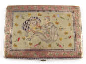 Appraisal: A white metal cigarete case with engraved and enamelled erotic