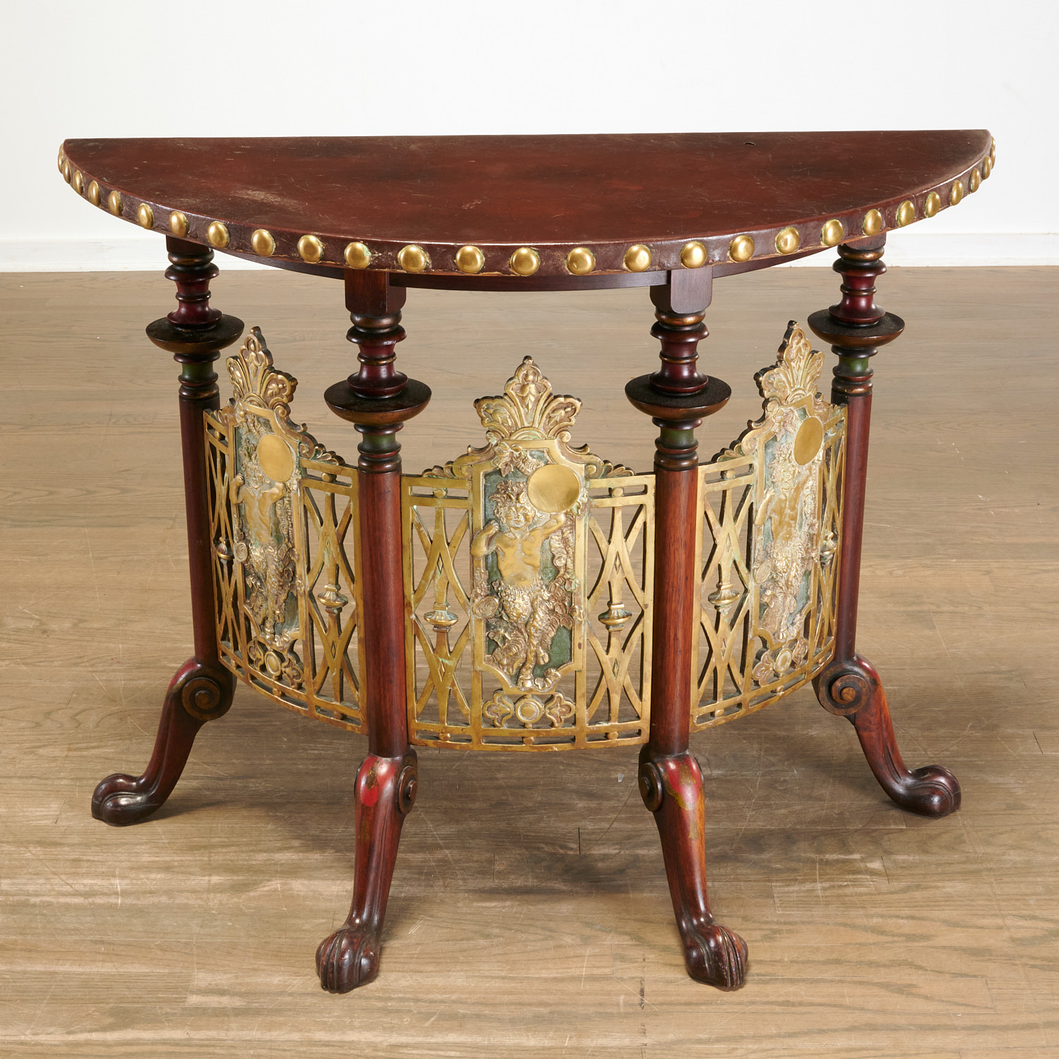 Appraisal: UNUSUAL AESTHETIC STYLE MAHOGANY BRASS CONSOLE th c leather top