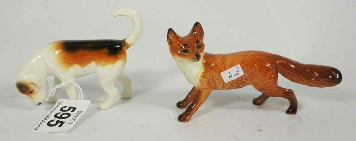 Appraisal: Beswick Foxhound and Standing Fox