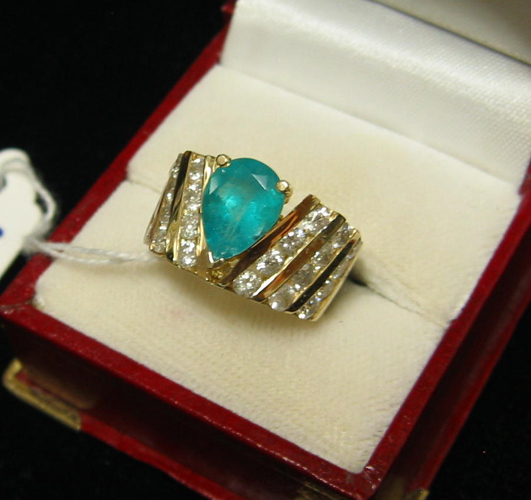 Appraisal: EMERALD DIAMOND AND FOURTEEN KARAT GOLD RING WITH APPRAISAL centering