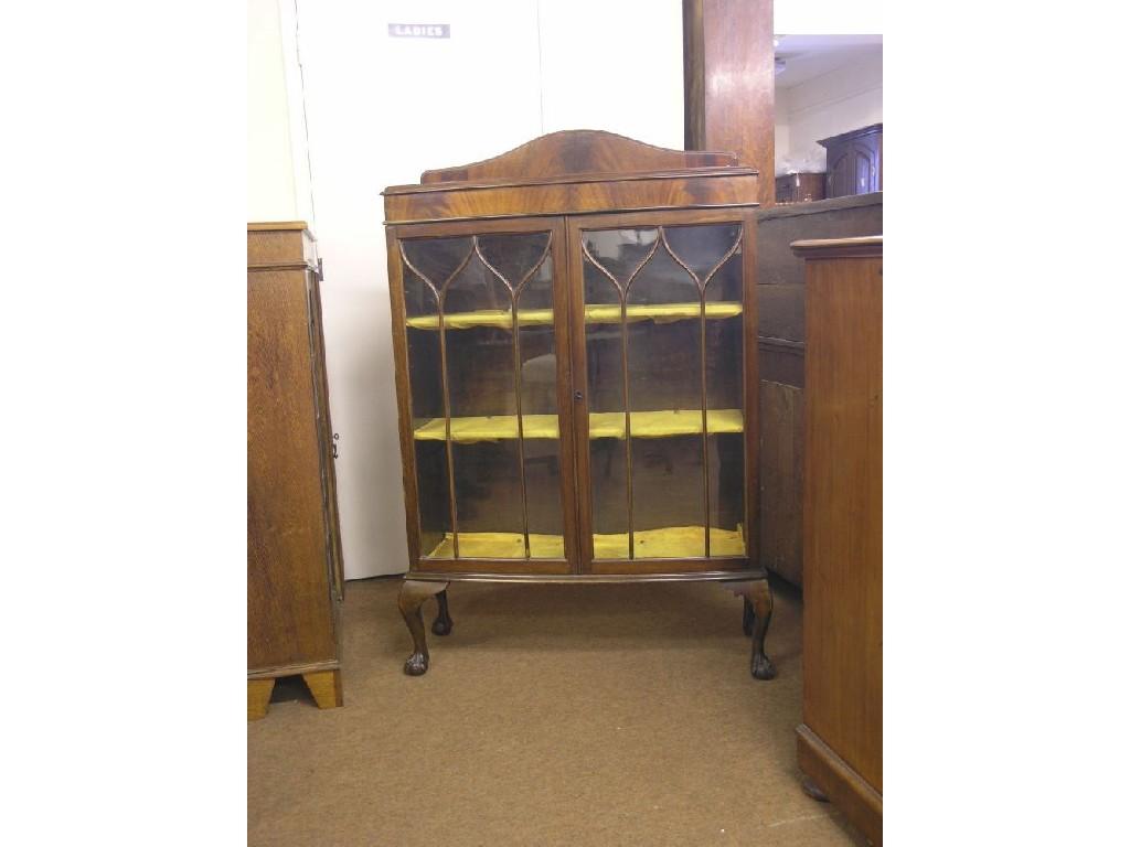 Appraisal: An early th century mahogany bookcase bow-fronted with a pair