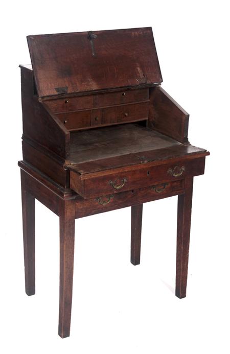 Appraisal: An adapted th century oak bureau on stand the lidded