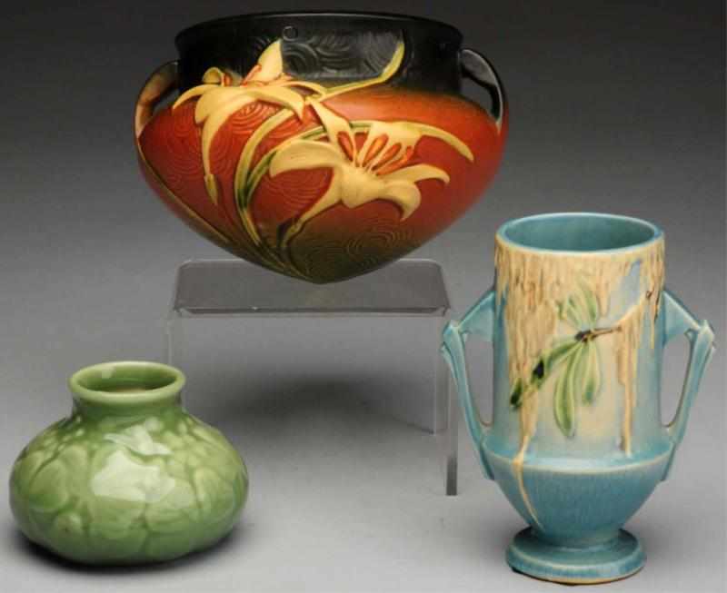 Appraisal: Lot of Pottery Vases Includes one Rookwood green squat vase