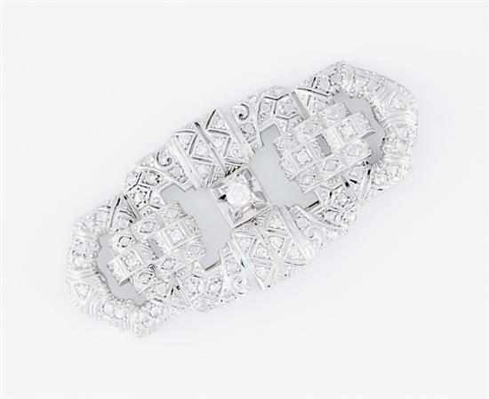 Appraisal: Art Deco platinum and diamond brooch circa rectangular openwork buckle-form