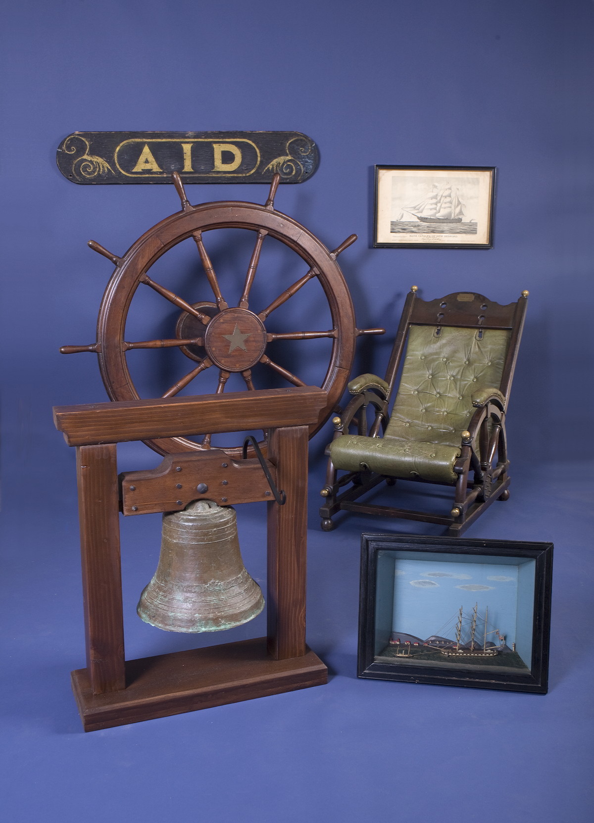 Appraisal: MAHOGANY AND BRASS SHIP'S WHEEL TABLE With central brass star