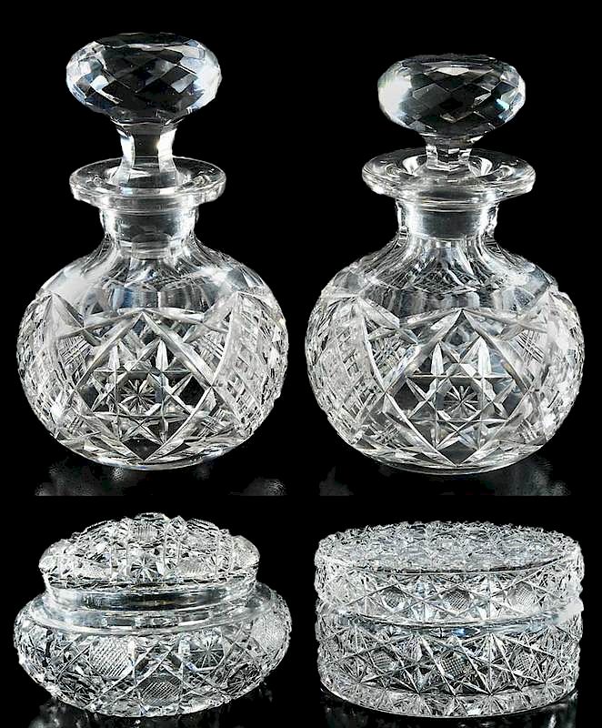 Appraisal: Four Brilliant Period Cut Glass Vanity Items pair of perfume