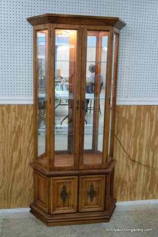 Appraisal: Oak Lighted Double Glass Door Curio CabinetThis is for a