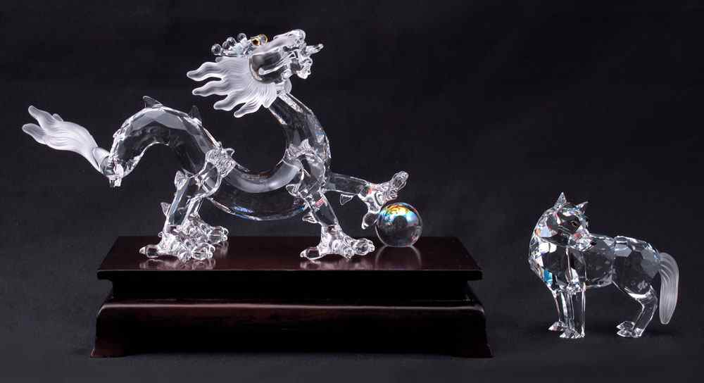 Appraisal: SWAROVSKI CRYSTAL FIGURINES To include CRYSTAL ZODIAC DRAGON from Fables