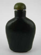 Appraisal: A dark green Chinese nephrite jade snuff bottle ht cm