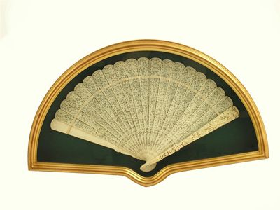 Appraisal: A Chinese export ivory bris fan c with carved sticks