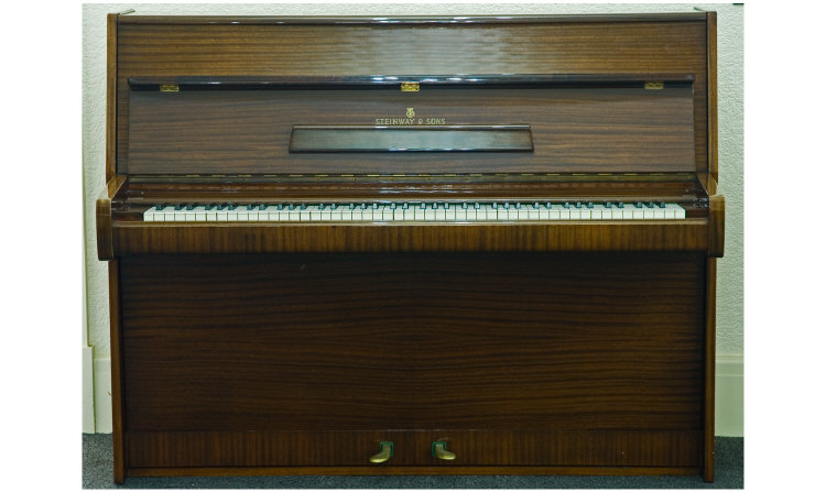 Appraisal: Steinway Sons Upright Piano In highly glossed rosewood inches wide