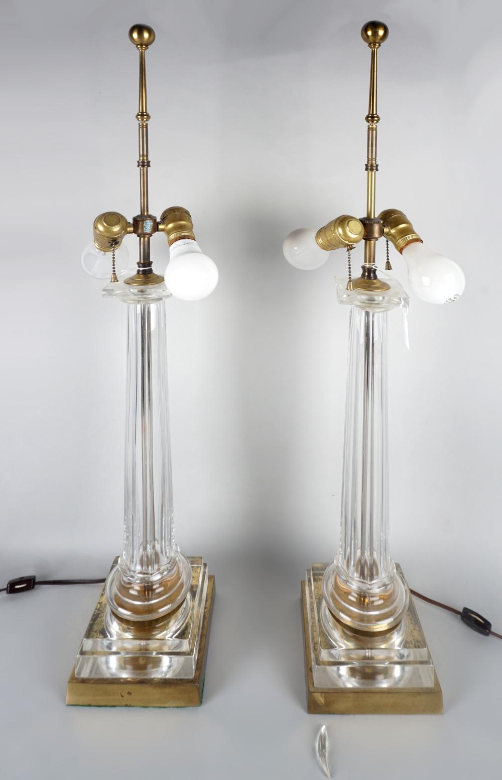 Appraisal: PAIR OF LUCITE COLUMNAR TABLE LAMPS both formed as a