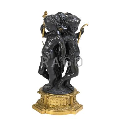 Appraisal: CLASSICAL BRONZE SCULPTURE Three cherubs with wreath bow and torch