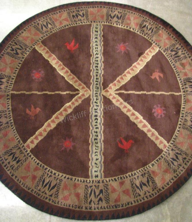 Appraisal: Handmade Oriental Round Area Rug Tibetan design brown field with