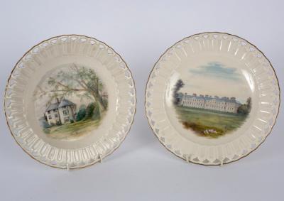 Appraisal: A pair of Belleek pierced plates painted with country houses