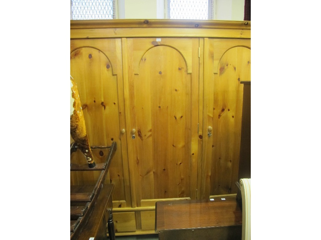 Appraisal: Large pine three door wardrobe