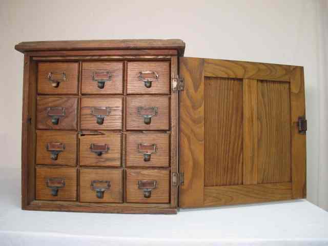 Appraisal: Antique Keystone View slide card filing cabinet Locks on front