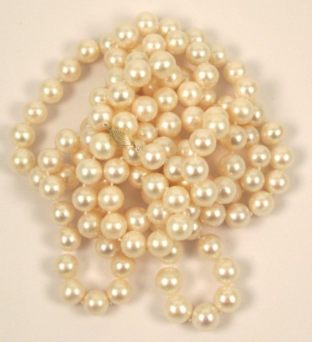 Appraisal: PEARL AND FOURTEEN KARAT GOLD NECKLACE strung with well matched