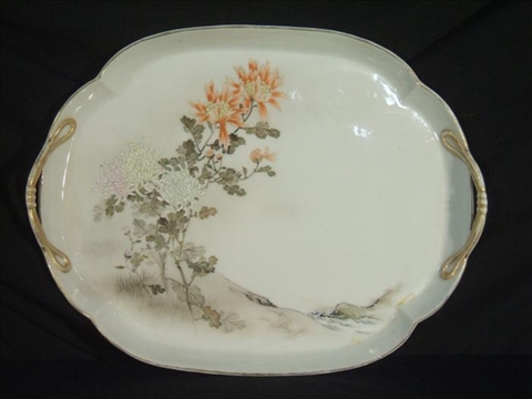 Appraisal: JAPANESE SHAPED-RECTANGULAR PLATTER Probably Fukugawa with cord handles and branches