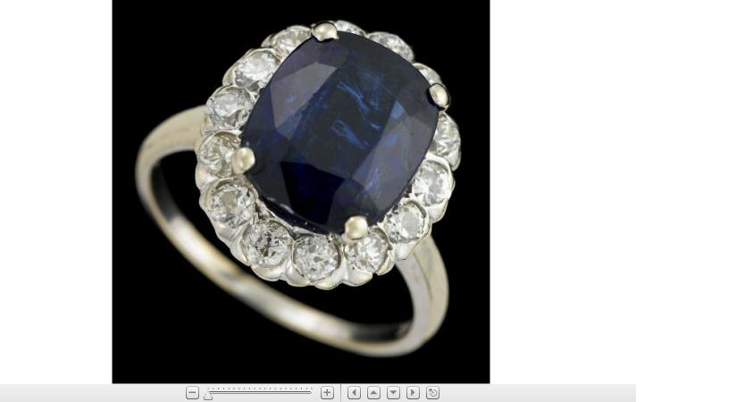 Appraisal: karat white gold sapphire and diamond ringTraditional oval cut prong