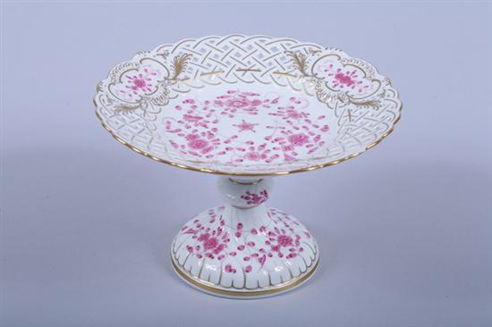 Appraisal: MEISSEN PORCELAIN COMPOTE early th century Reticulated border decorated with