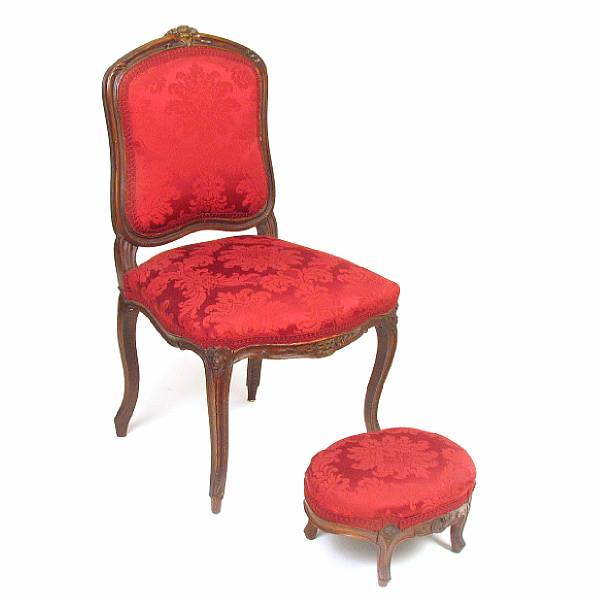 Appraisal: A French Rococo style walnut chair with stool height in