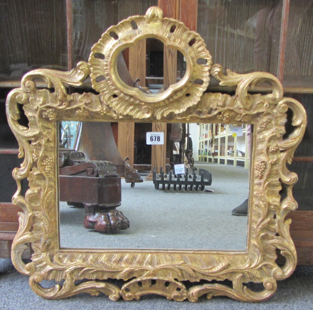 Appraisal: A th century gilt framed wall mirror with moulded frame