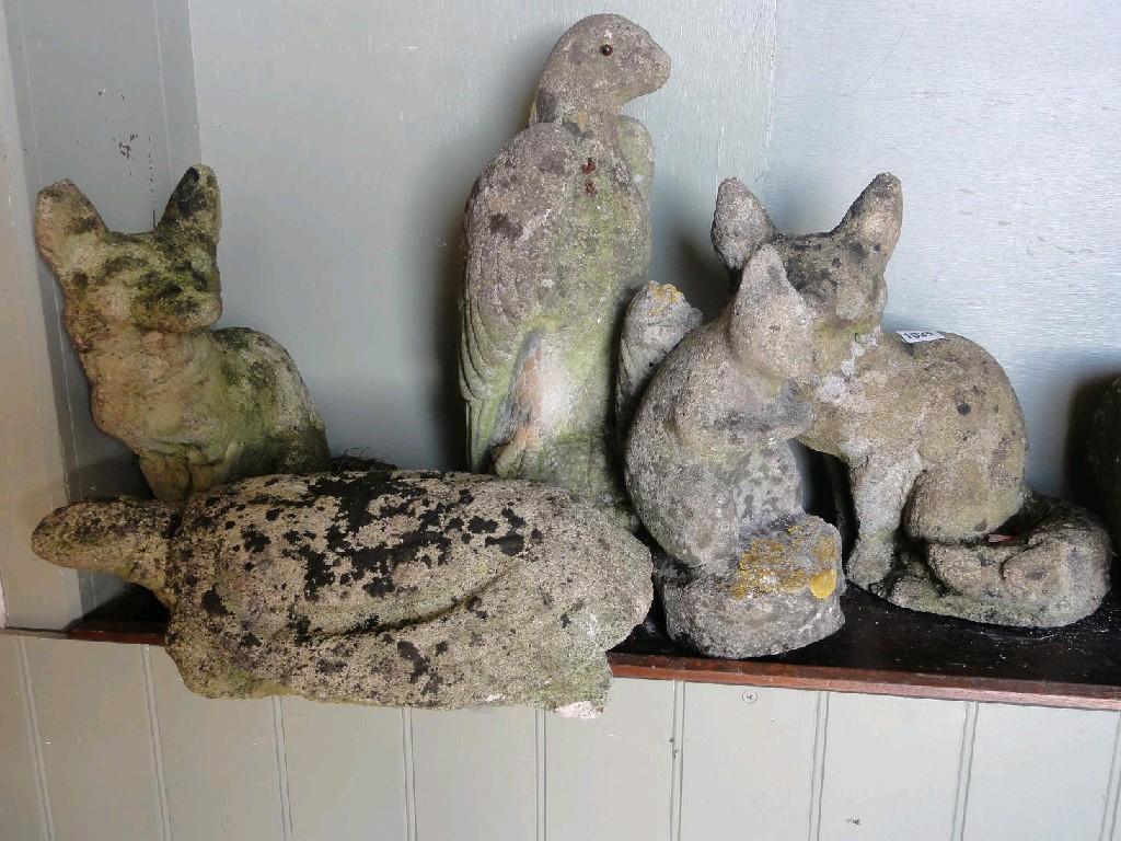 Appraisal: Five weathered composition stone garden ornaments in the form of