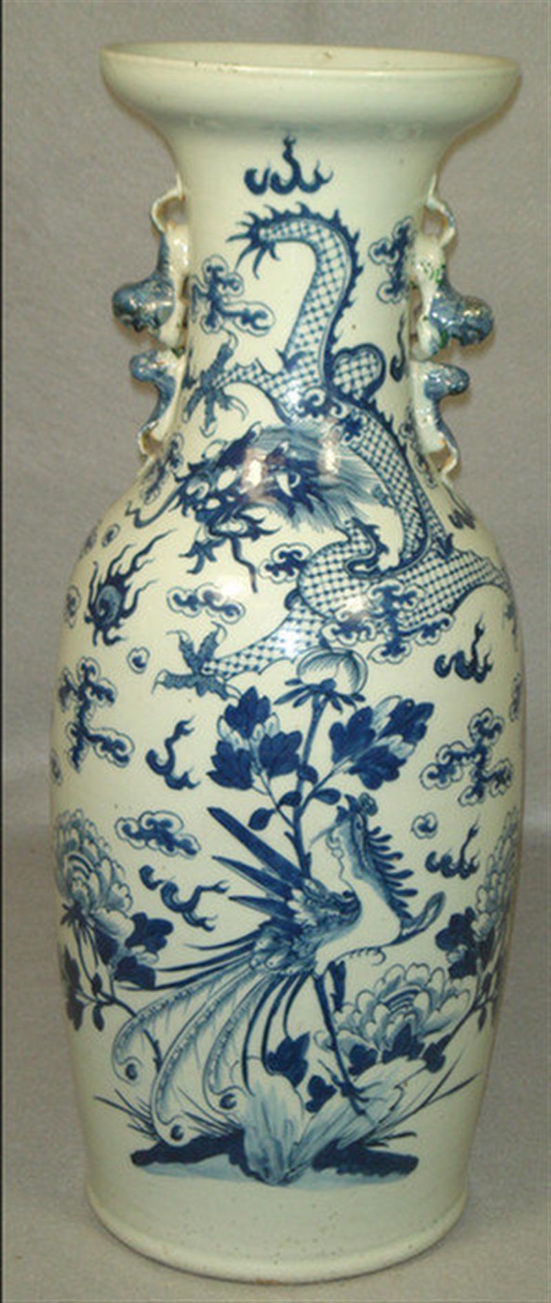 Appraisal: th th c Chinese porcelain vase with dragon and phoenix