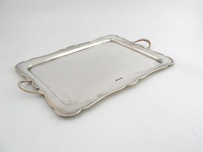 Appraisal: A silver two-handled tray by H Atkin Sheffield shaped rectangular