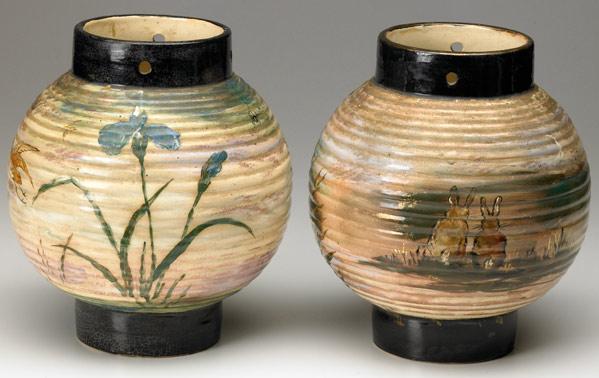 Appraisal: ROOKWOOD Pair of early and rare lantern vessels decorated by