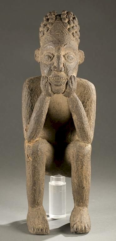 Appraisal: Cameroon Grasslands seated figure th c A seated figure resting