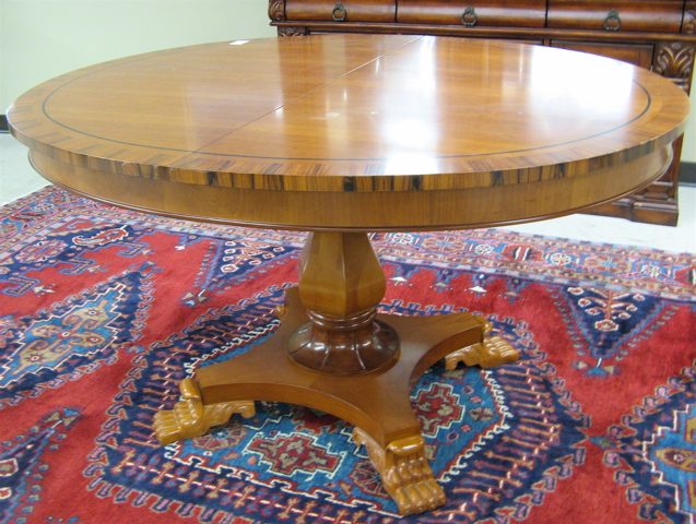 Appraisal: OVAL REGENCY STYLE PEDESTAL DINING TABLE th century the oval