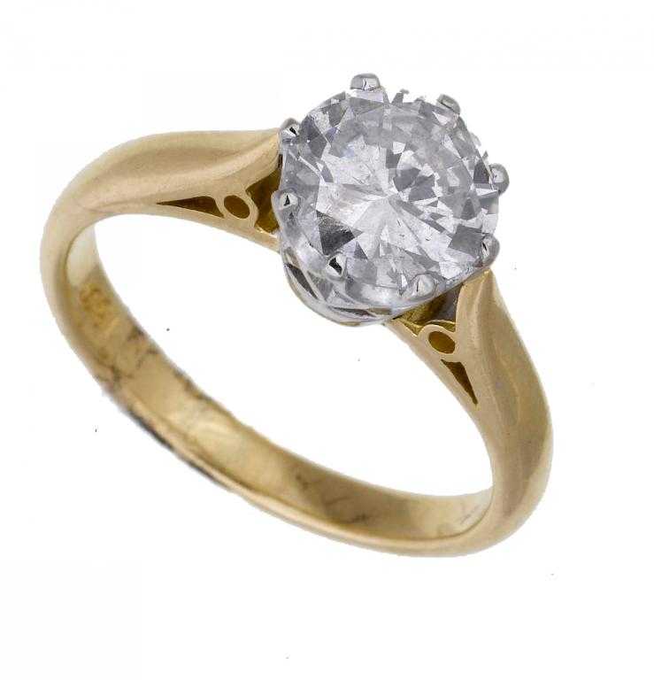 Appraisal: A DIAMOND SOLITAIRE RING gold hoop