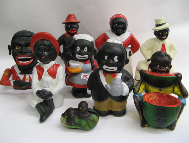 Appraisal: REPRODUCTION BLACK AMERICANA COIN BANKS pieces cast iron Includes a