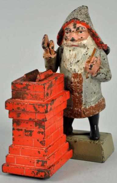 Appraisal: Cast Iron Santa Claus Mechanical Bank Manufactured by Shepard Hardware