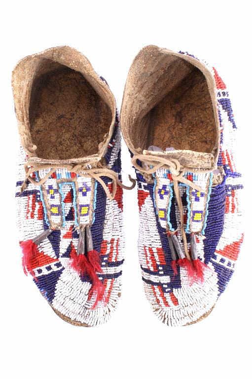 Appraisal: Sioux Flag Beaded Bifurcated Moccasins th C This is an