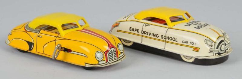 Appraisal: Lot of Tin Marx Automobile Wind-Up Toys Description American Working