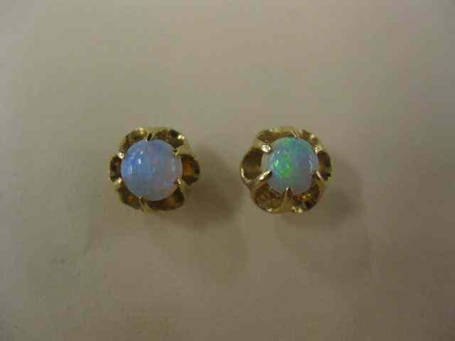 Appraisal: Opal Earrings fiery gems in k yellow gold pierced settings