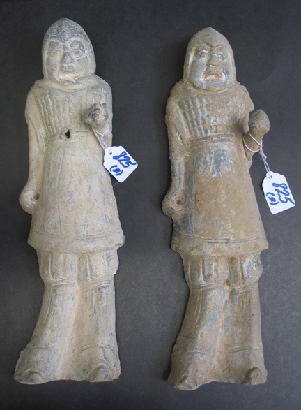 Appraisal: A PAIR OF CHINESE POTTERY FIGURAL TOMB GUARDS each with