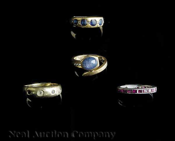 Appraisal: A Group of Four Ladies' Rings one silver channel set