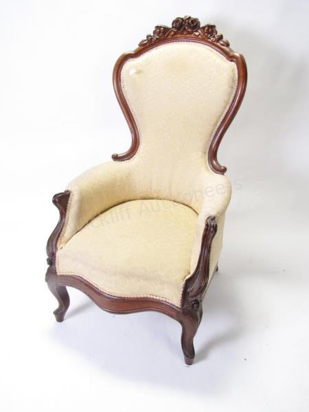 Appraisal: A Victorian slipper chair carved walnut frame with rose and