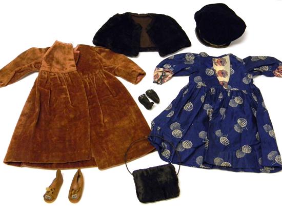 Appraisal: Collection of doll clothing and accessories seven pieces including rust-colored