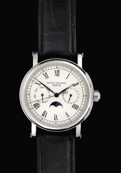 Appraisal: Gentleman's chronograph wristwatch Chronograph wristwatch white toned enamel face Roman