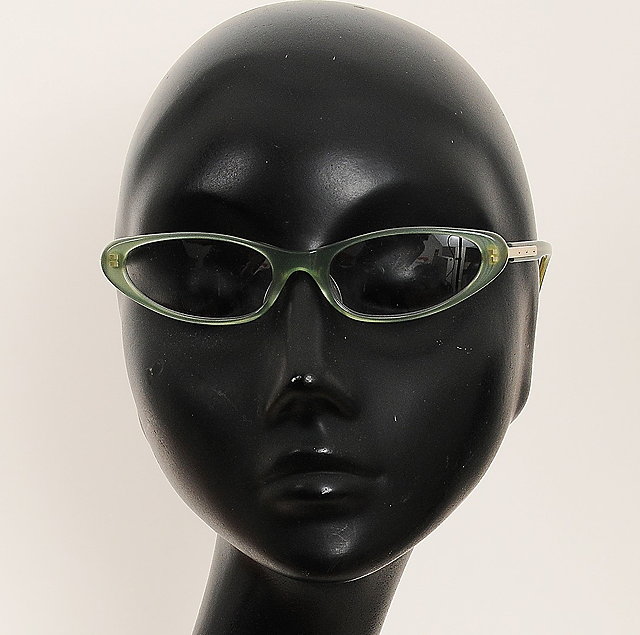 Appraisal: A pair of Alexander McQueen reading glasses pale green frames