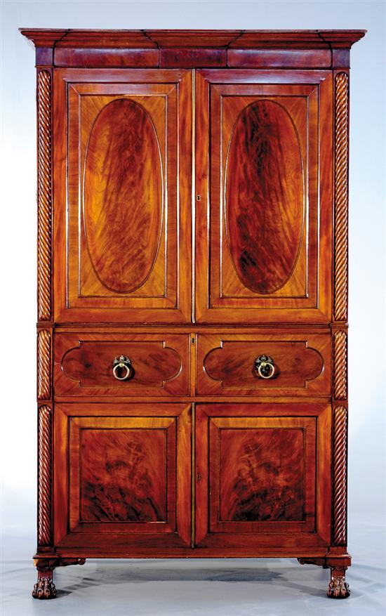 Appraisal: English Classical carved mahogany linen press circa stepped and molded