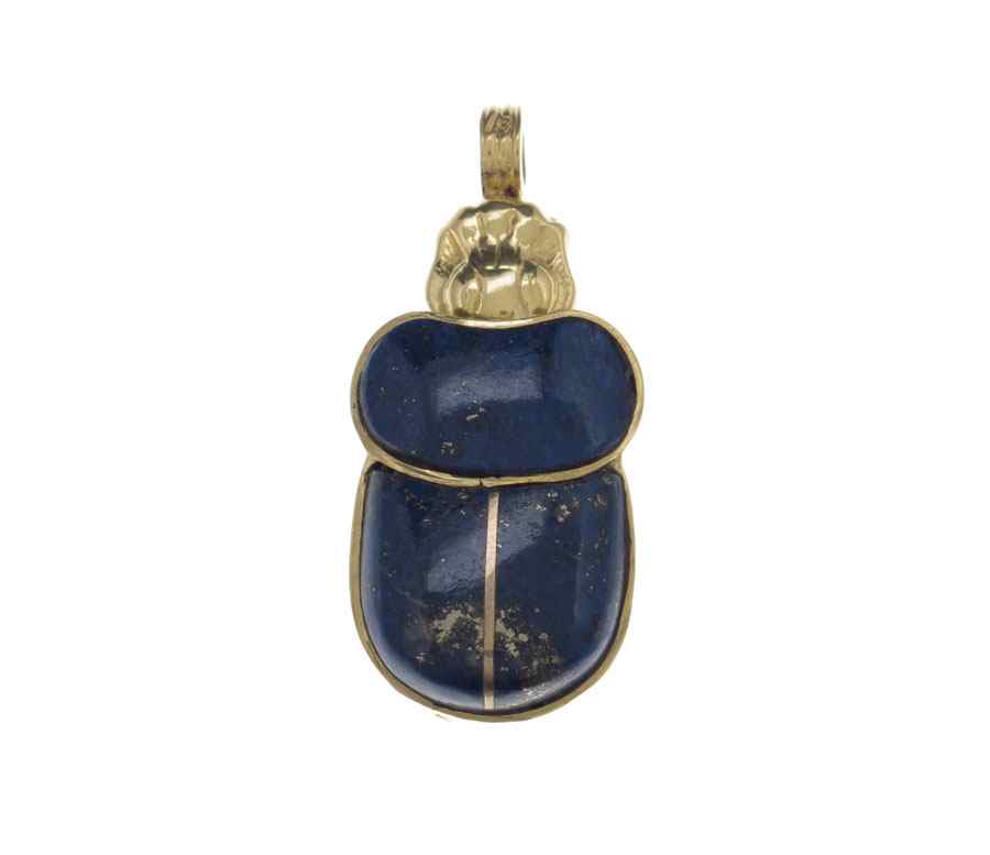 Appraisal: K LAPIS SCARAB PENDANT K yellow gold pendant contains three