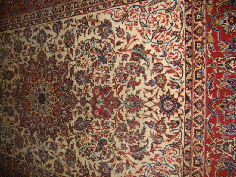 Appraisal: ISFAHAN ROOM RUG The ivory field of intricate curvilinear floral